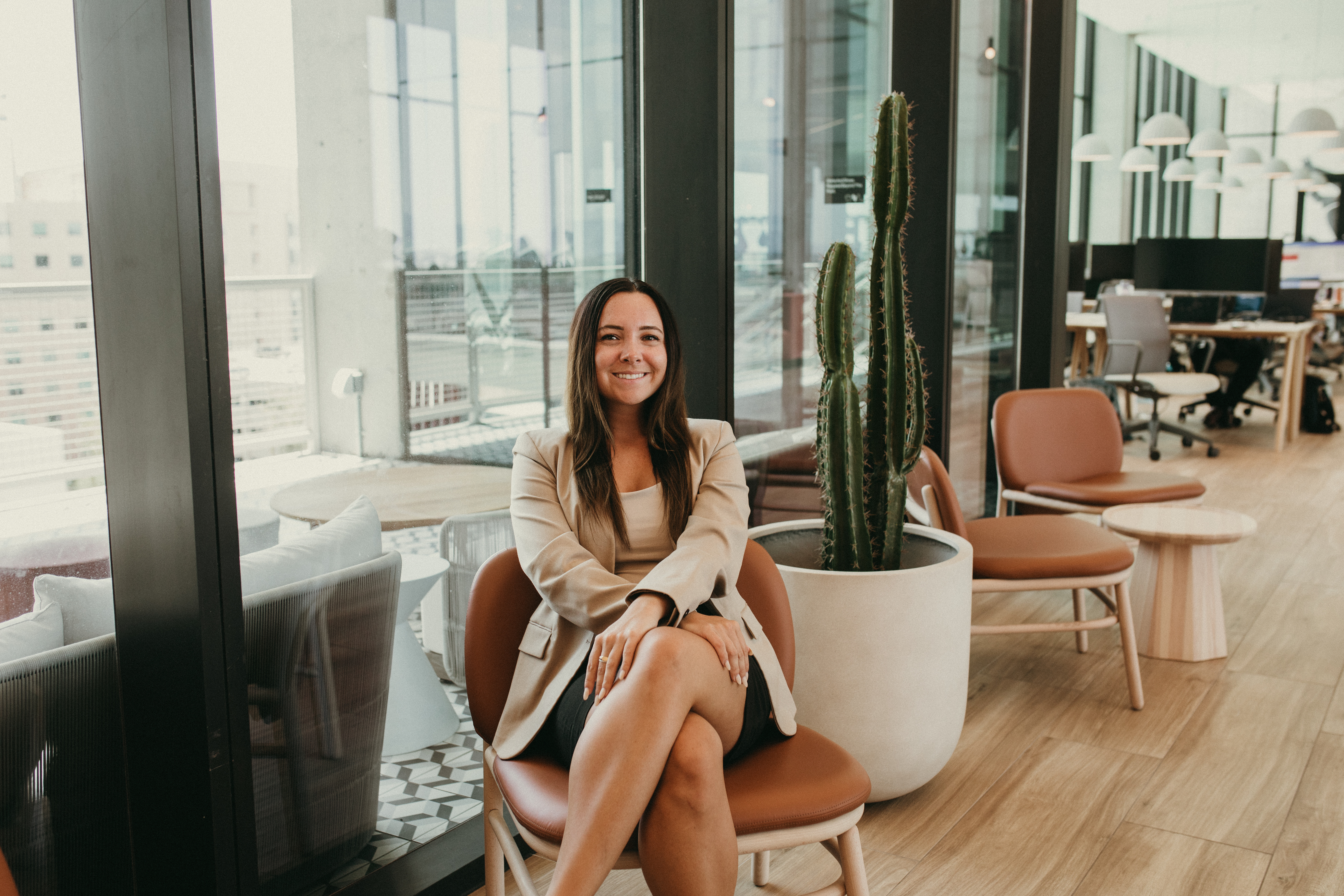 Mallory in a modern office space